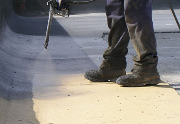 Coating systems over Knoxville spray foam roof systems